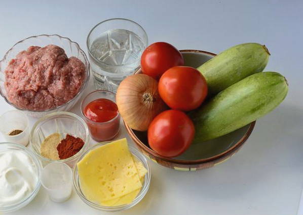Кабачки с сыром и помидорами в духовке
