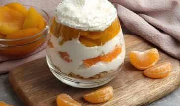 На новогодний стол: рецепт сливочного десерта с мандаринами и сухофруктами